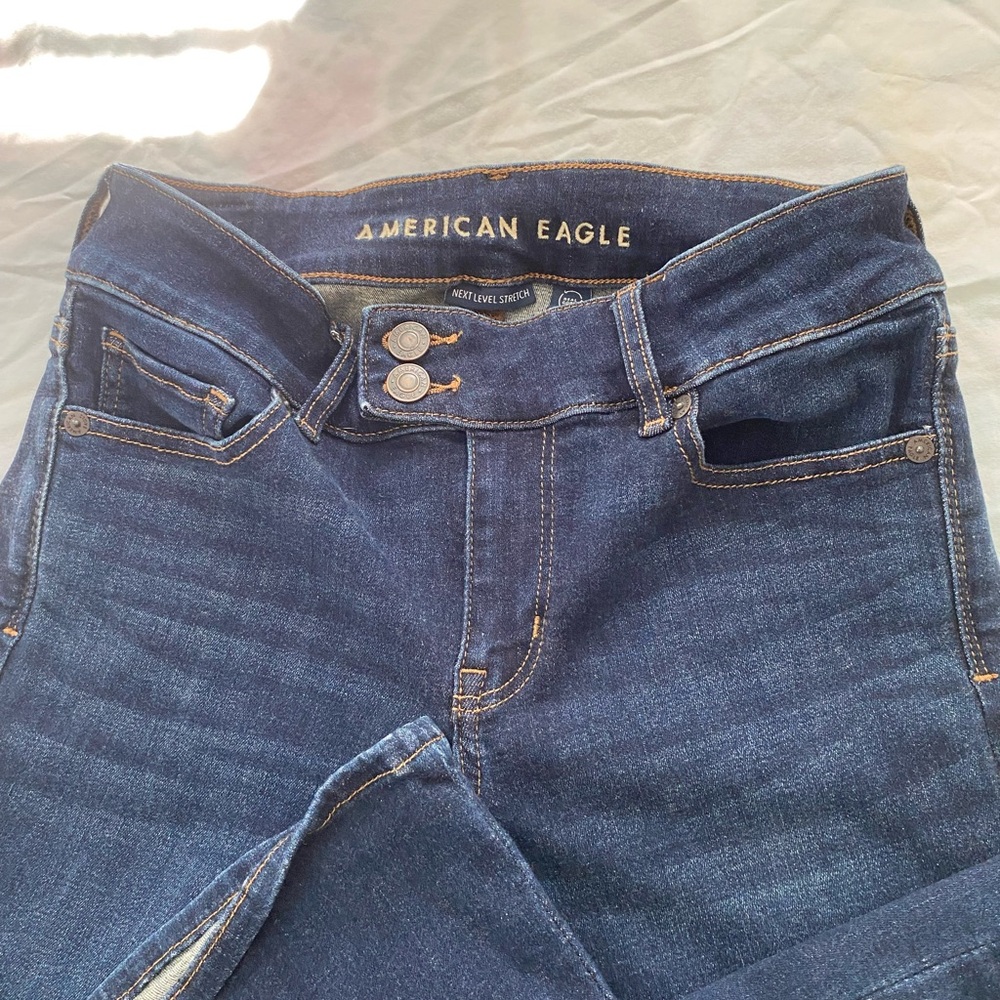 American Eagle Outfitters low rise boot cut  dark wash next level stretch jeans
